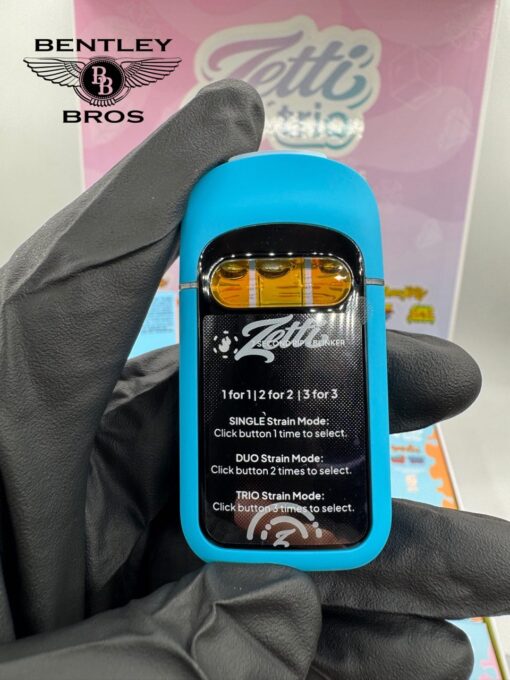 ZETTI TRIO 2G Disposable vape hardware showing three multi-chamber strain tanks